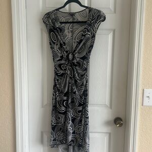 black and white sleeveless dress.